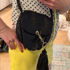 Henri Bendel Leather Black Textured Crossbody Bag with purple satin lining